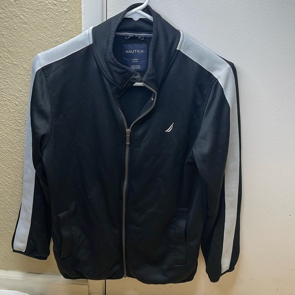 Boys black and white size 14/16 Nautica zip up sweater.